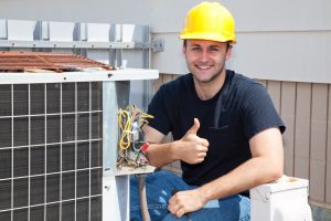 HVAC repair technician repairing AC unit